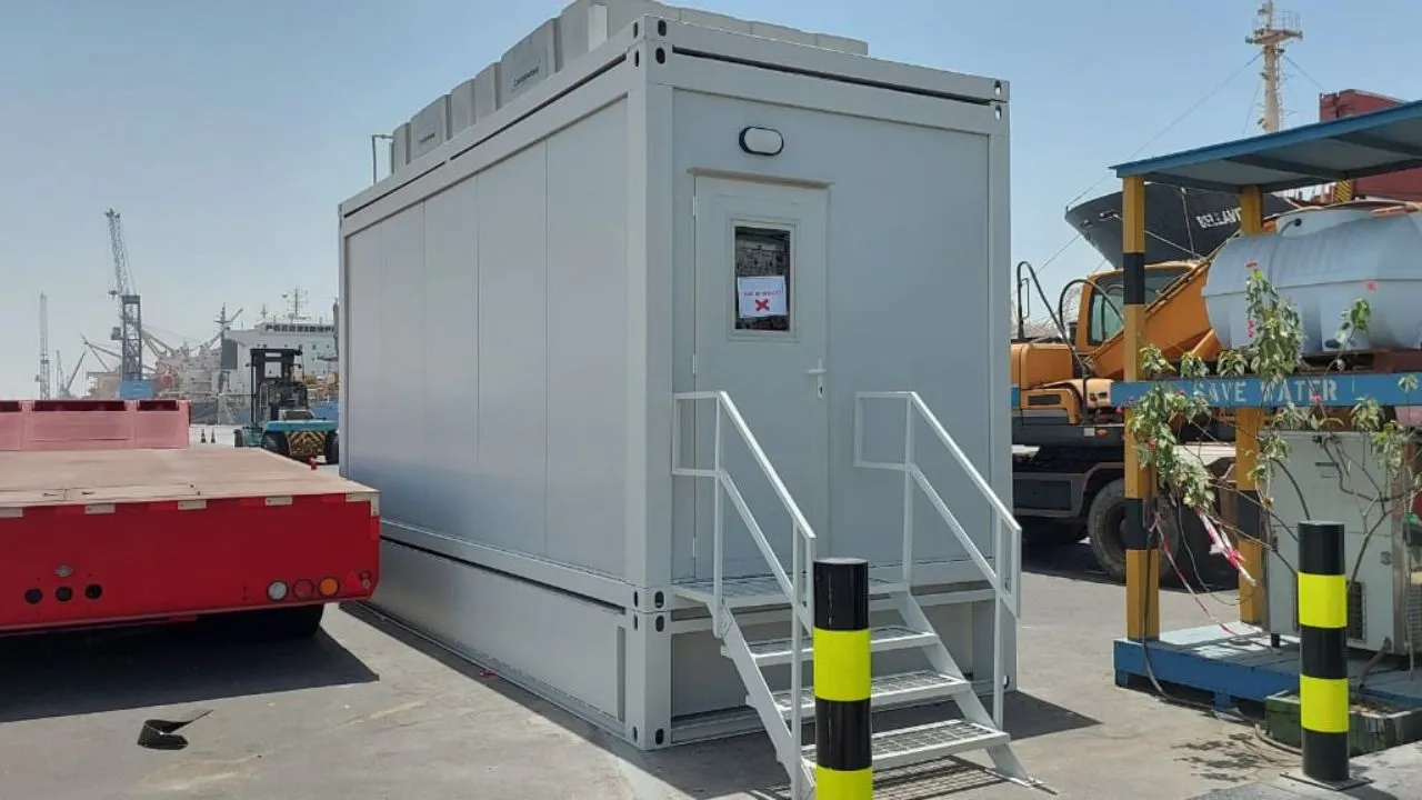 container toilet made using modular mobile container also attached with water and septic tanks